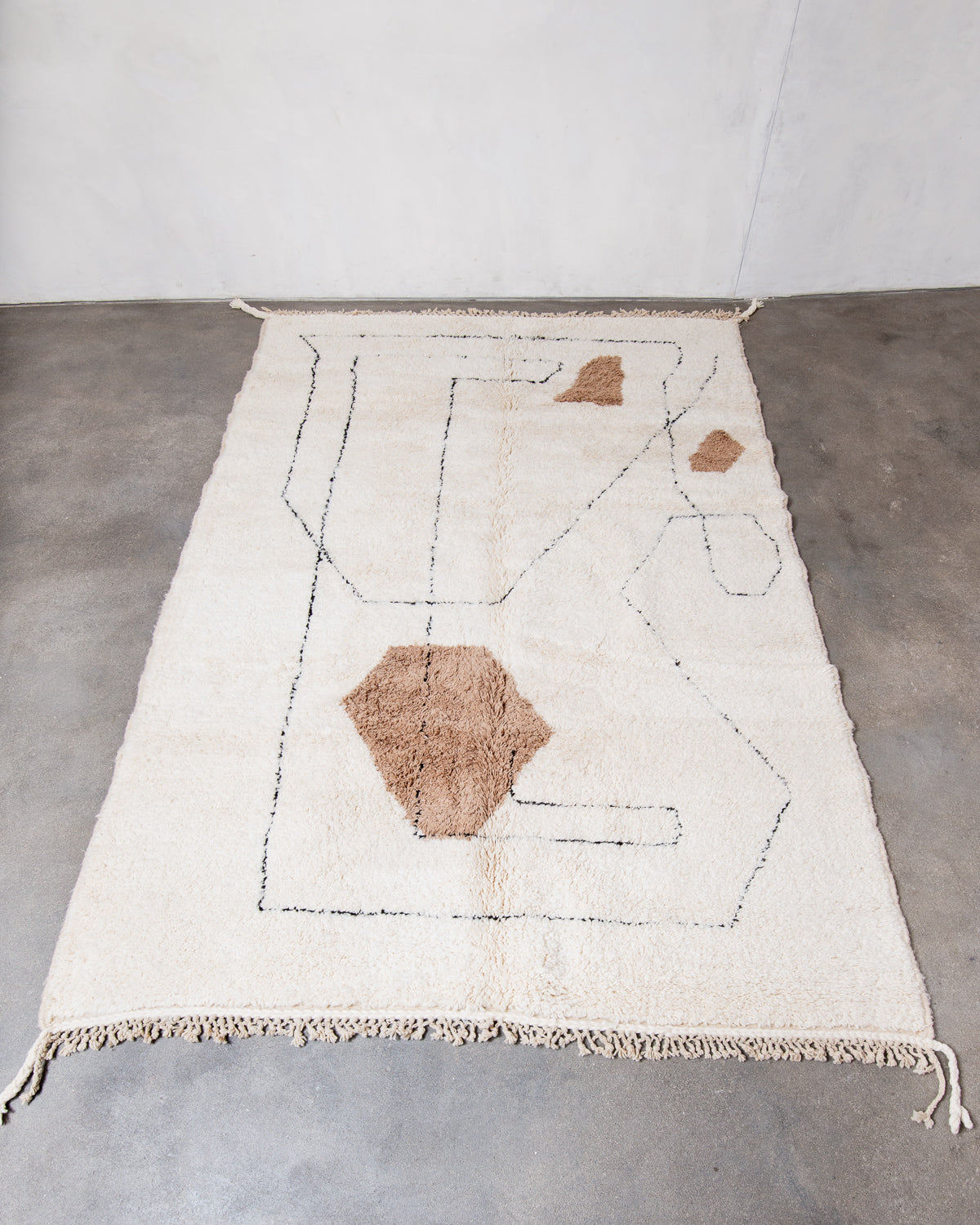 Modern, designer, handcrafted Berber rug from Morocco. Beniourain carpet with beautiful colours and patterns and fluffy wool texture.